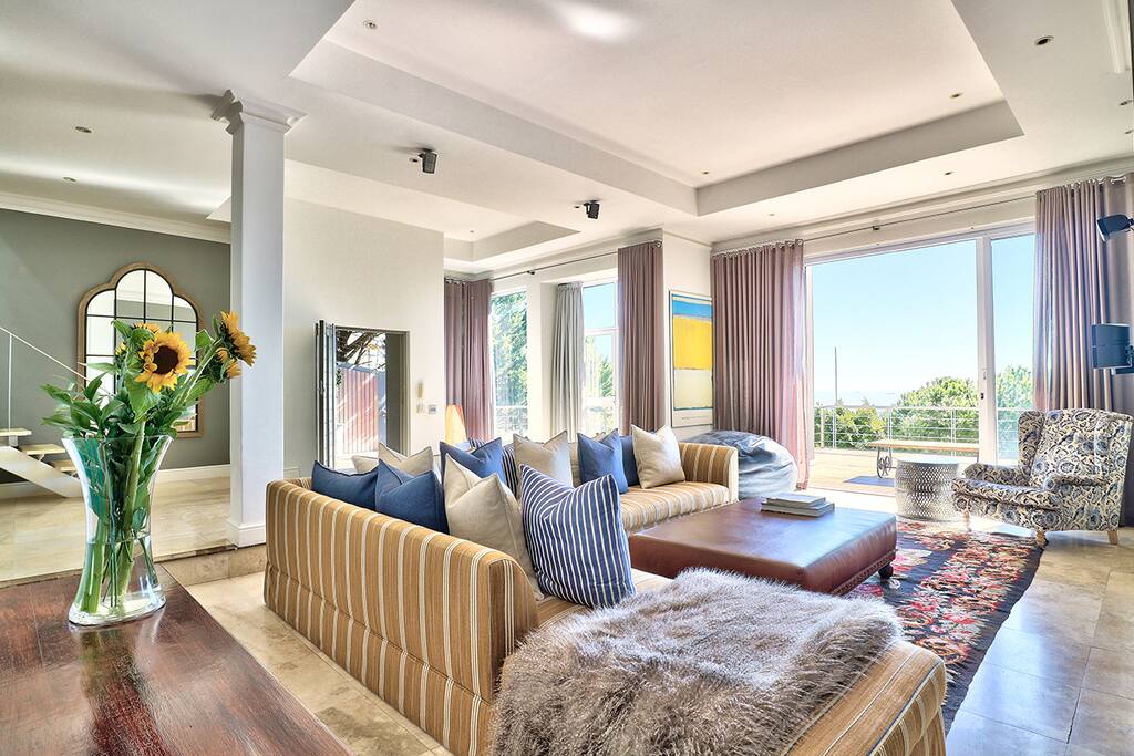 Spacious and comfortable Lounge leading out onto the deck.
