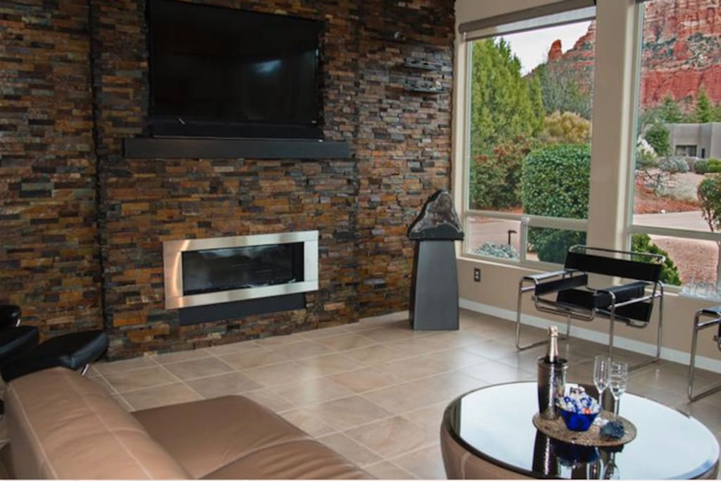 Napoleon Gas Fireplace - Living Room with a red rock view