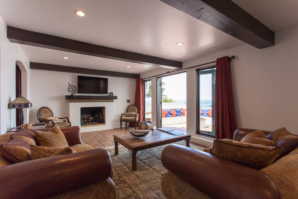 Living Room with french doors to courtyard and firepit