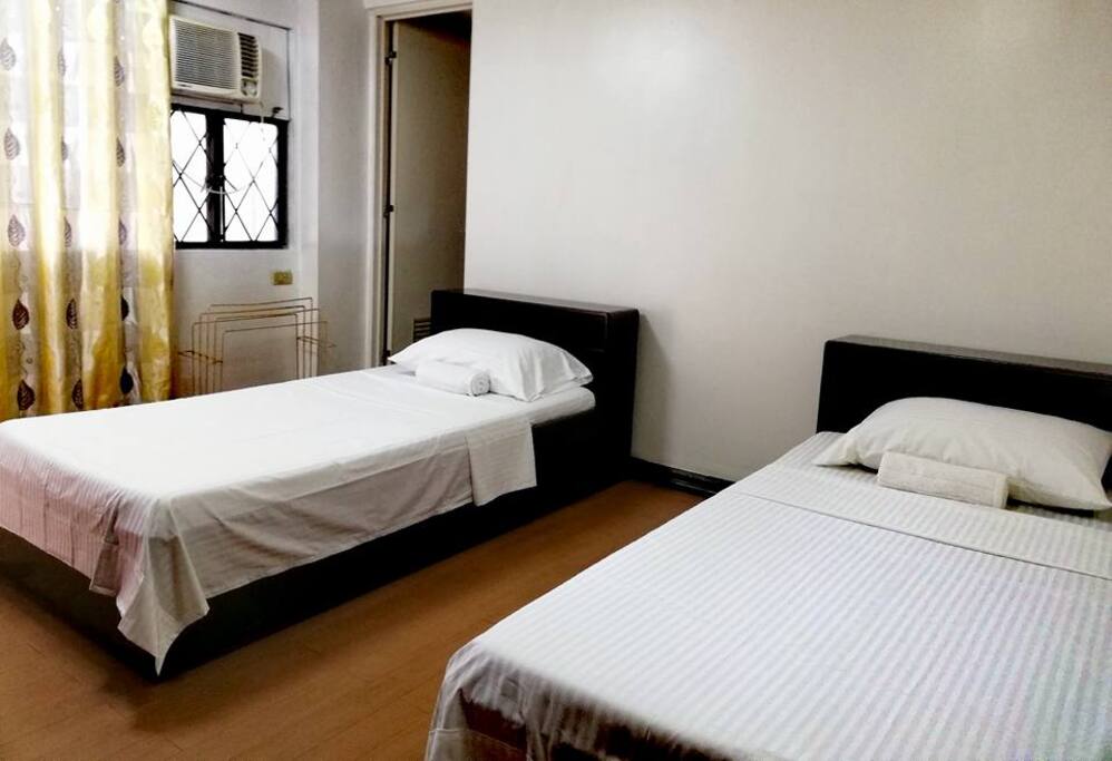 private Room, 2 single beds, with private toilet and bath, comes with breakfast