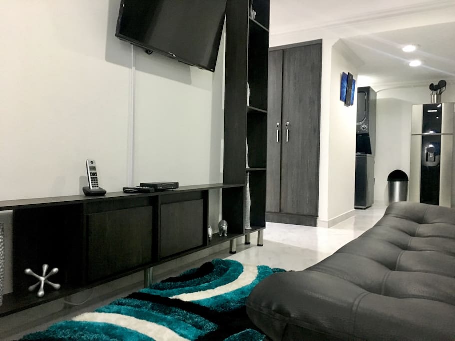 Living Room with Smart TV, Sofa Bed, Bar, Phone, Cable, Wifi, Fan and Balcony