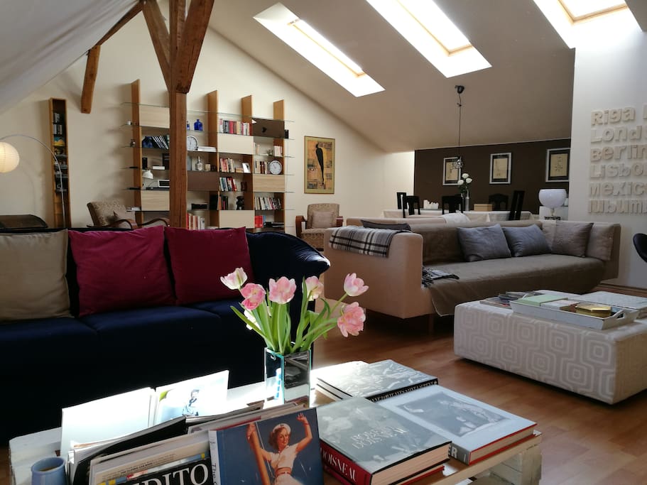 This is the living room with blue sofas for reading and light one for chilling