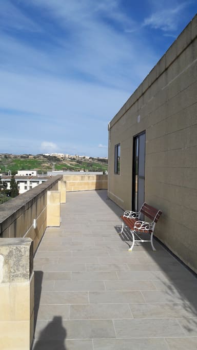 70 feet long south west facing terrace. The hot tub is around the corner.