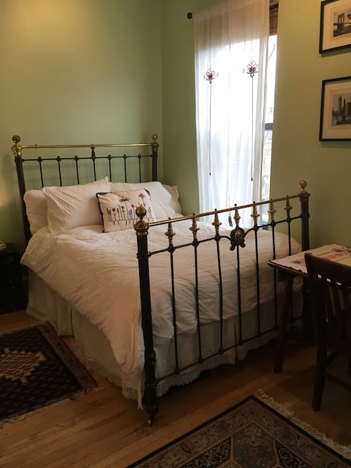 Your comfy full sized bed with a new memory foam mattress on an authentic victorian brass bed