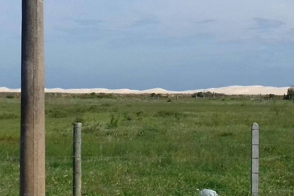 Maiores dunas de SC com acesso pela vegetação nativa, atras tem uma praia 100% preservada