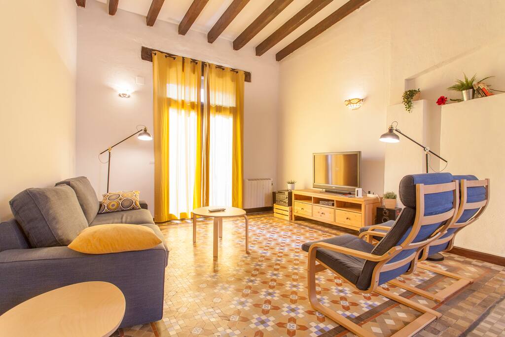 Living room with original tiled floor