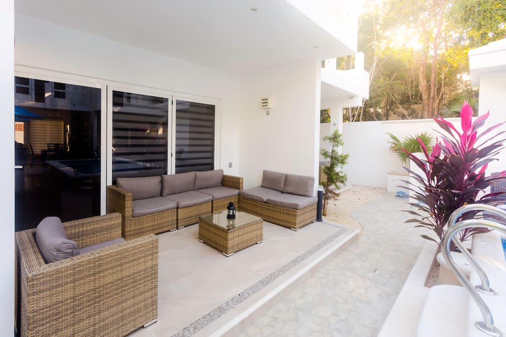 Covered poolside seating for six