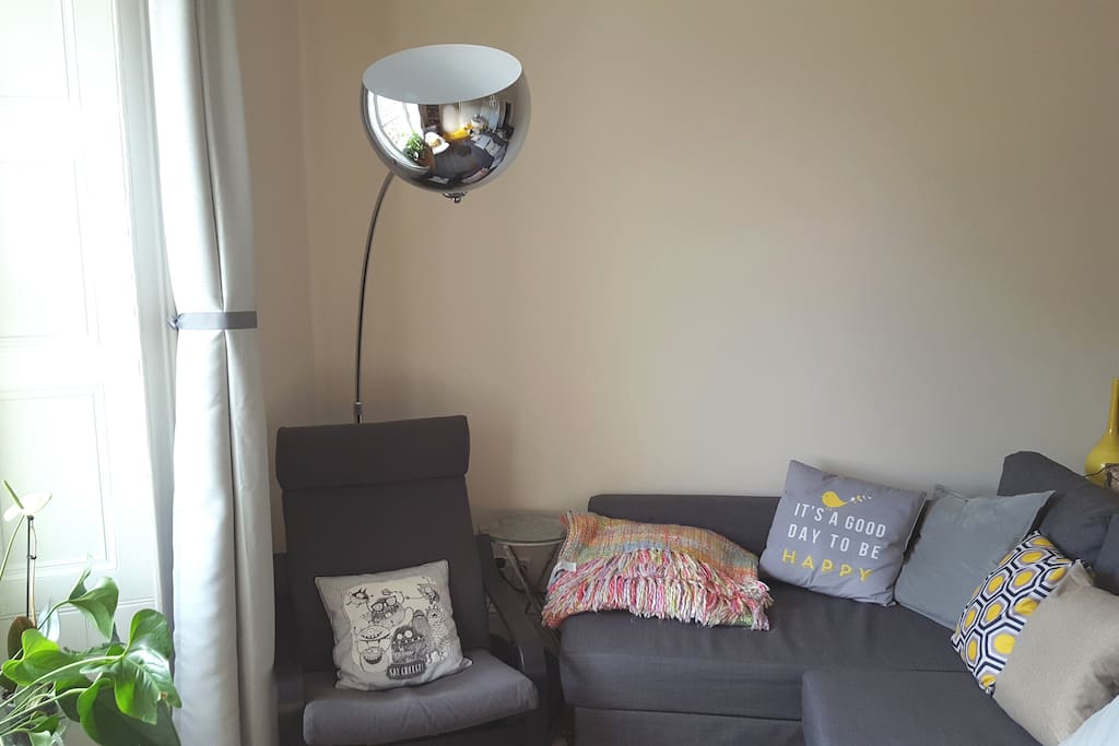 The living room is large and quiet and comes with a comfy queen size sofa bed that accommodates any additional guests