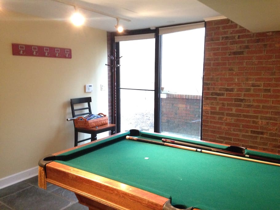 Pool table and entrance way.