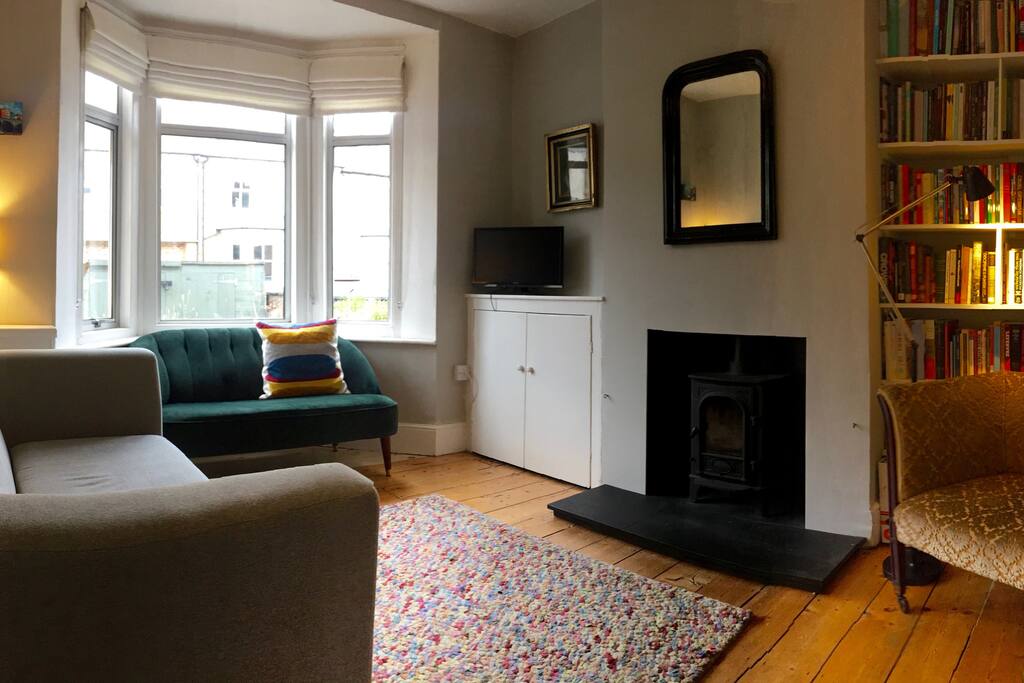 Warm cosy living room with wood burning stove (there will be a real christmas tree in here over christmas).