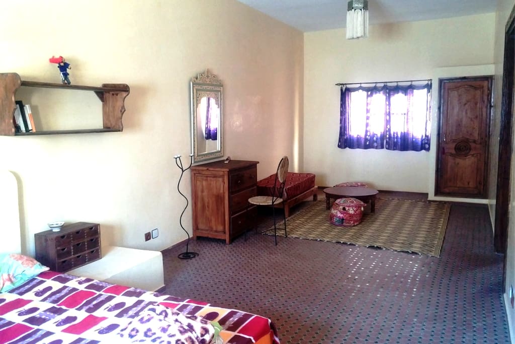 Spacious and luminous bedroom with double bed