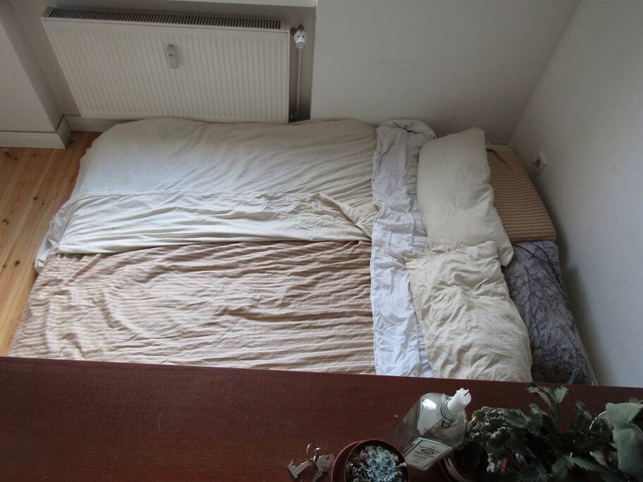 A cosy little nest behind the bookcase, with a perfect view of the stars from the last floor window.