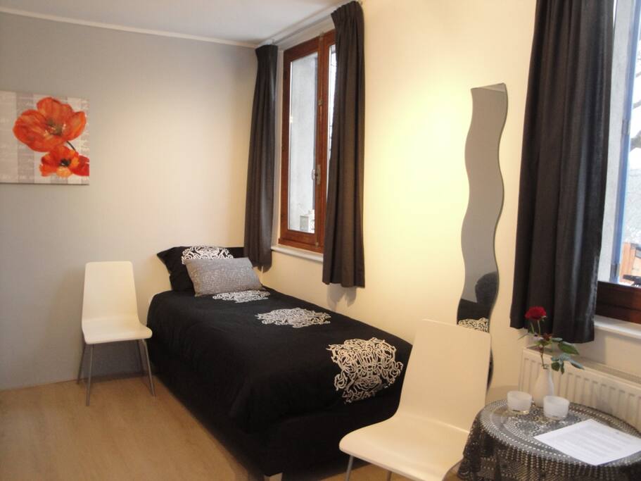 De kamer met comfortabele boxspringbedden