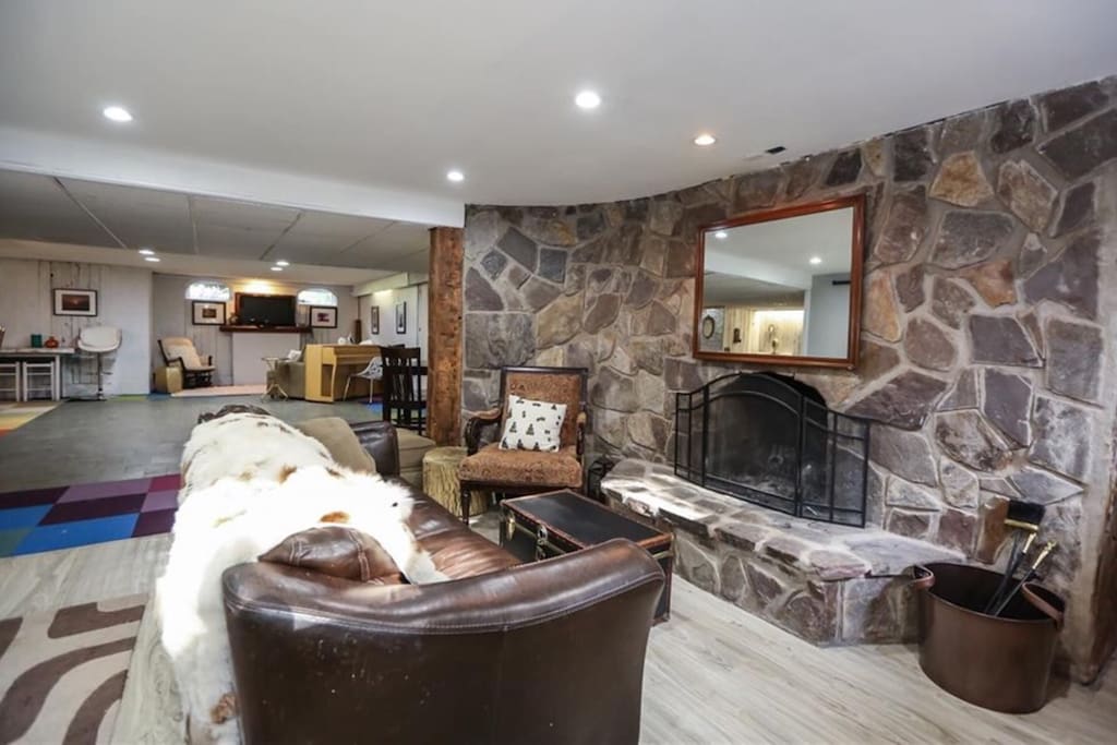 Fireplace sitting area near bar