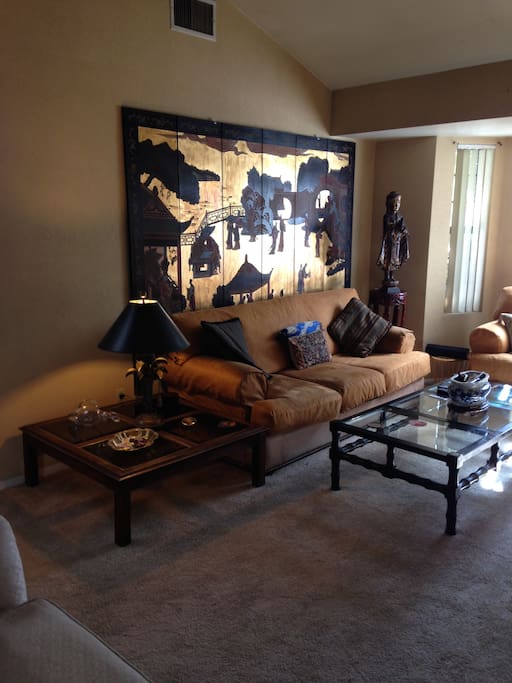 A CORNER OF THE COMFORTABLE LIVING ROOM