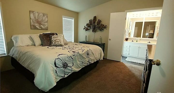 Find tranquility in this master bedroom with private bathroom