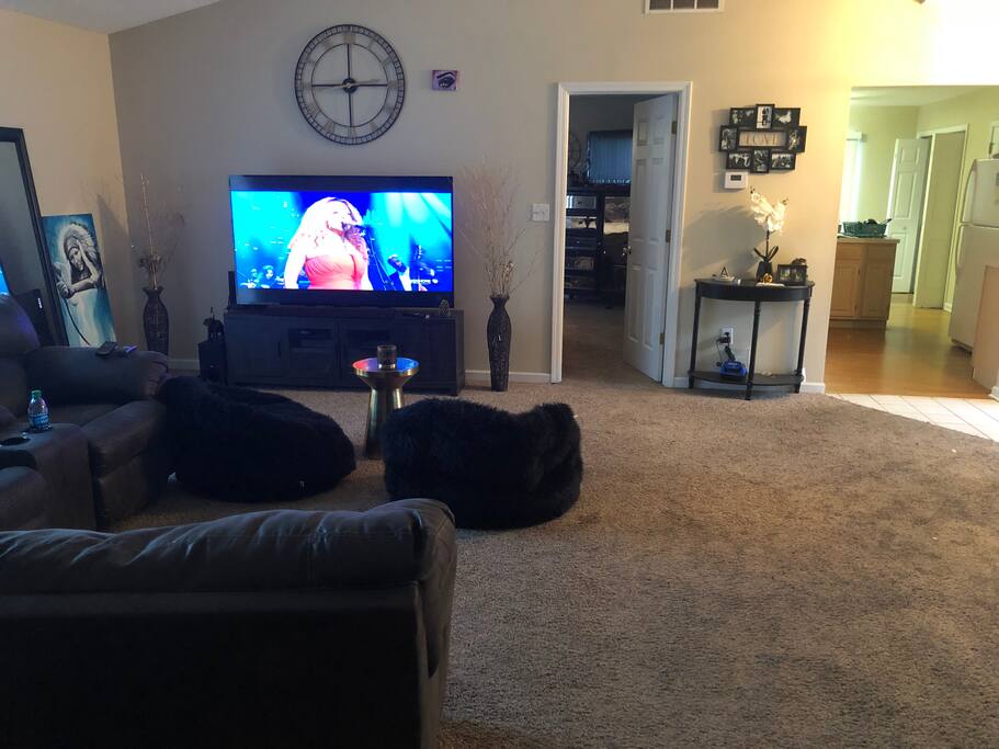 Living room with two comfort bean bags and a large sectional