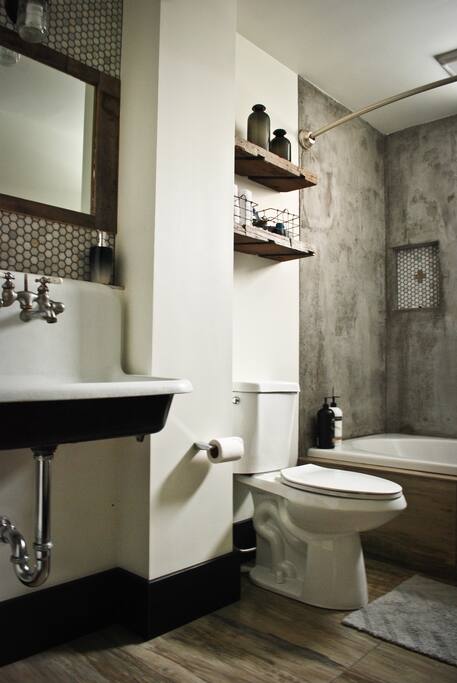 Awesome custom bathroom! Includes concrete walled tub/shower. Perfect for a soak.