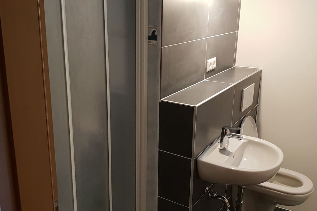Bathroom 1 - with shower, WC and basin