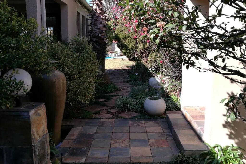 Relax in our beautiful garden, enjoy the sounds a water feature and the variety of wild birds that visit.