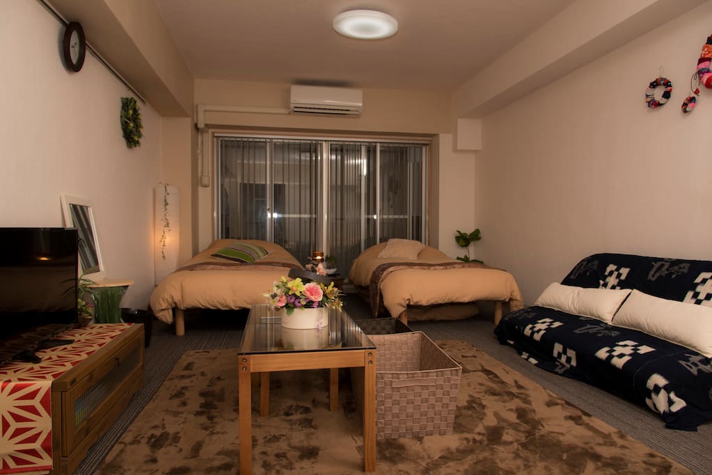 Comfortable bed room:) There are three beds one sofa bed:)