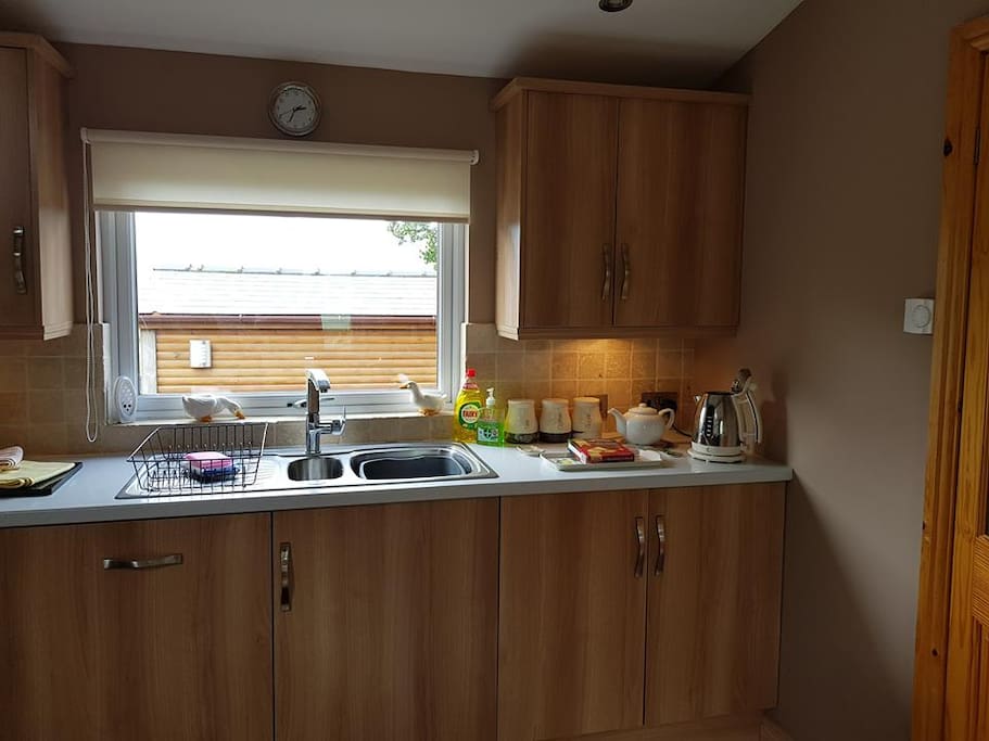 Kitchen fitted with all appliances and ample crockery etc.
