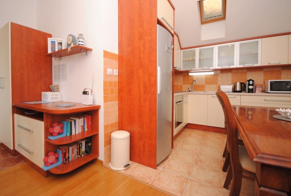 Kitchen and library in living room