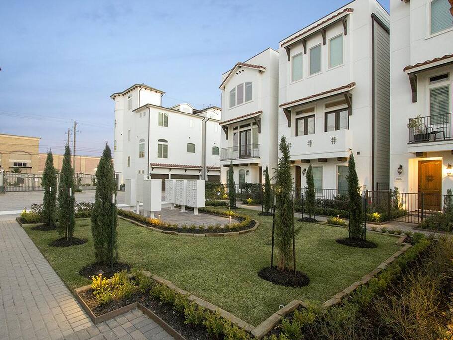Community Courtyard, Guest Parking, Mailboxes, Gated Entrance, Gated private front yards. My Townhouse is on the Left.