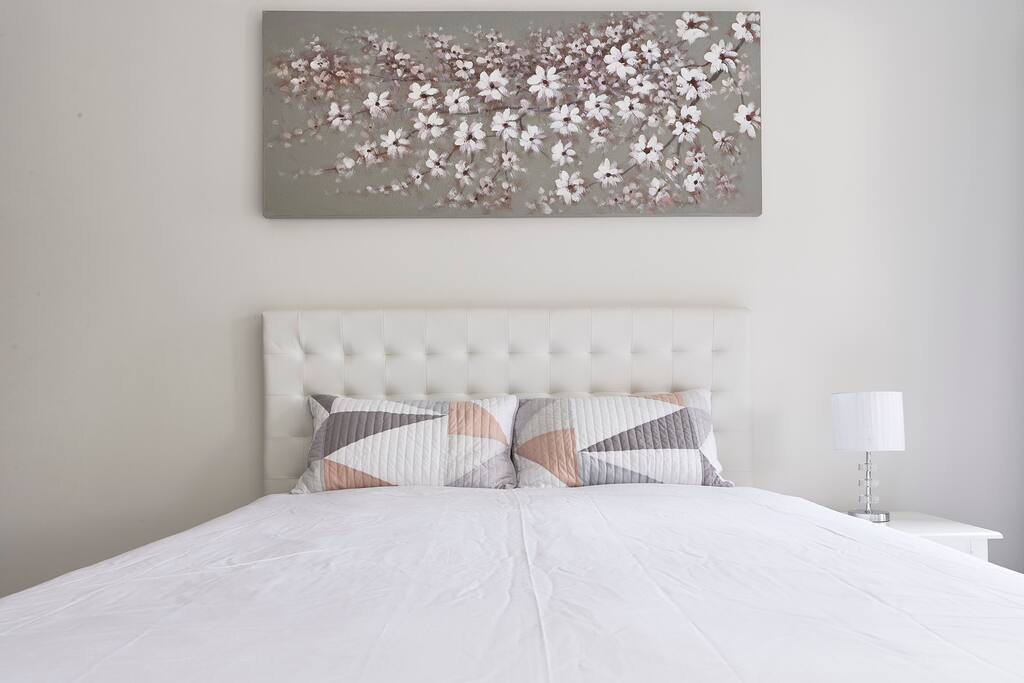 Another view of the spacious queen bed