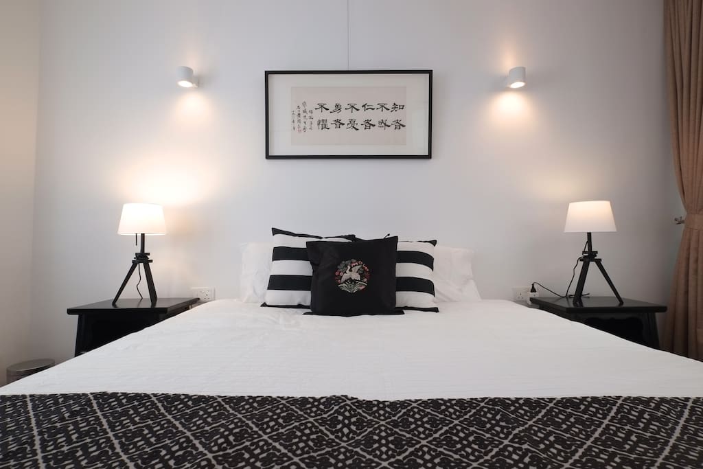 Black and white décor gives the room a modern chic in a historic setting.