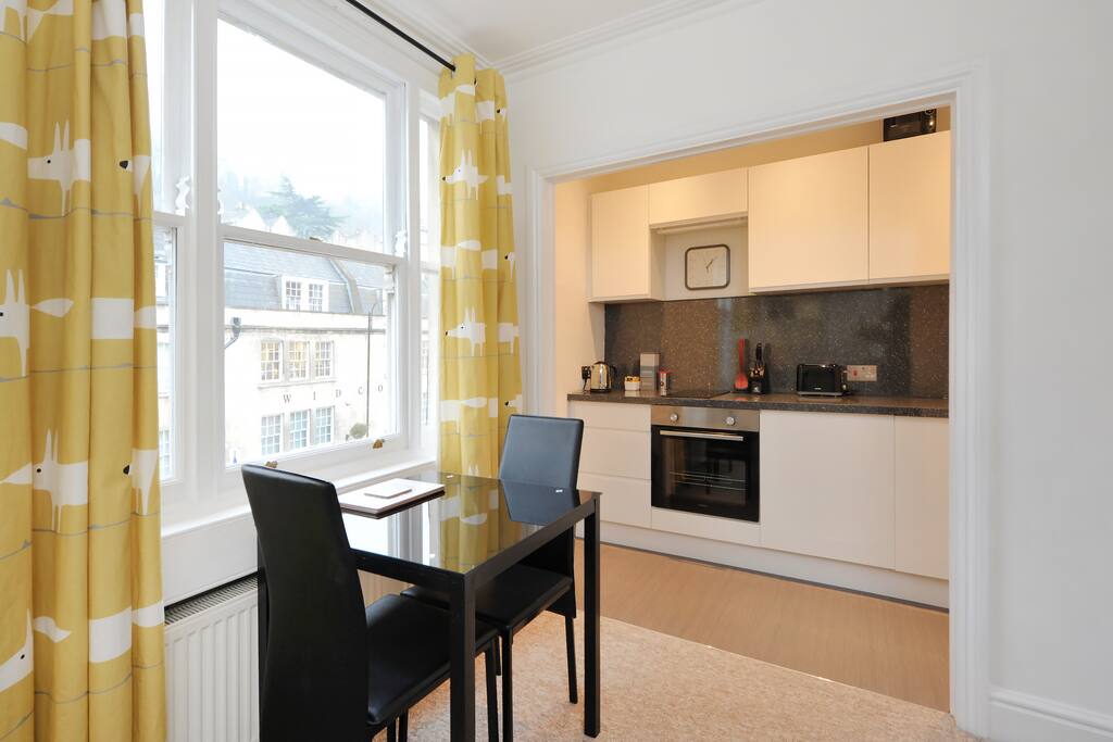 Fully equipped kitchen and dining area.