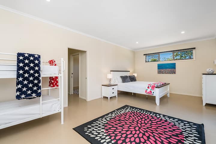 Cabin main bedroom queen bed and bunks