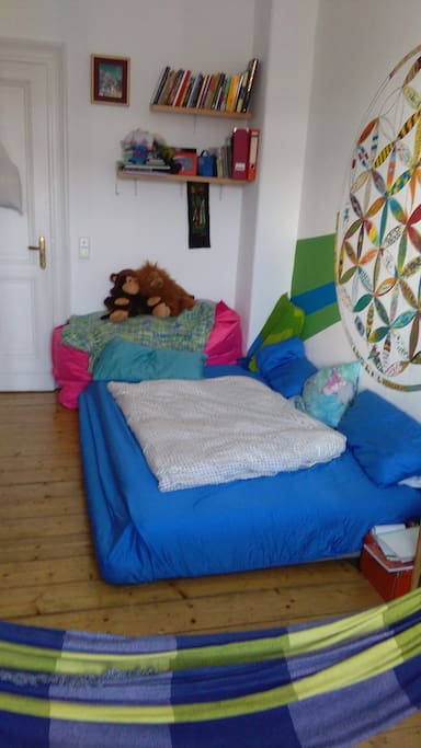 Cozy Bed and colorful walls