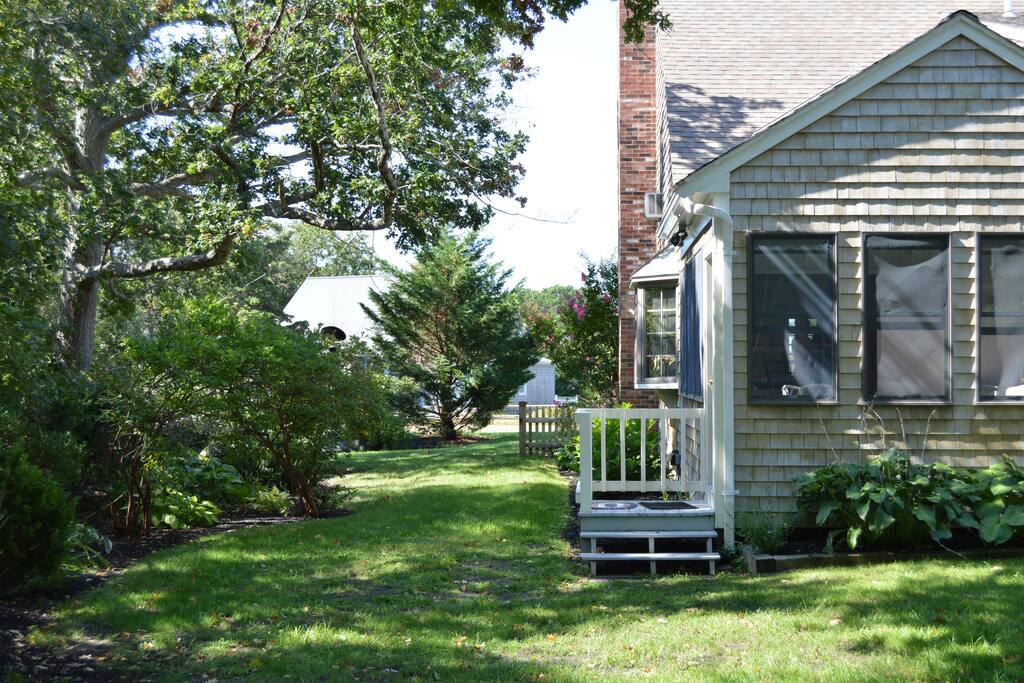 side yard, sunroom access