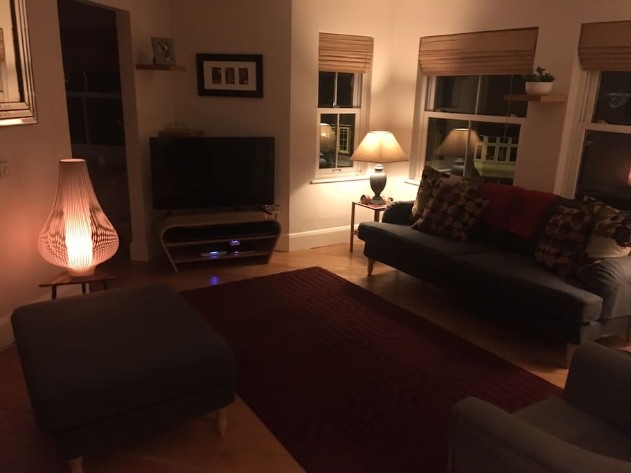 Living room is cosy in the evening.