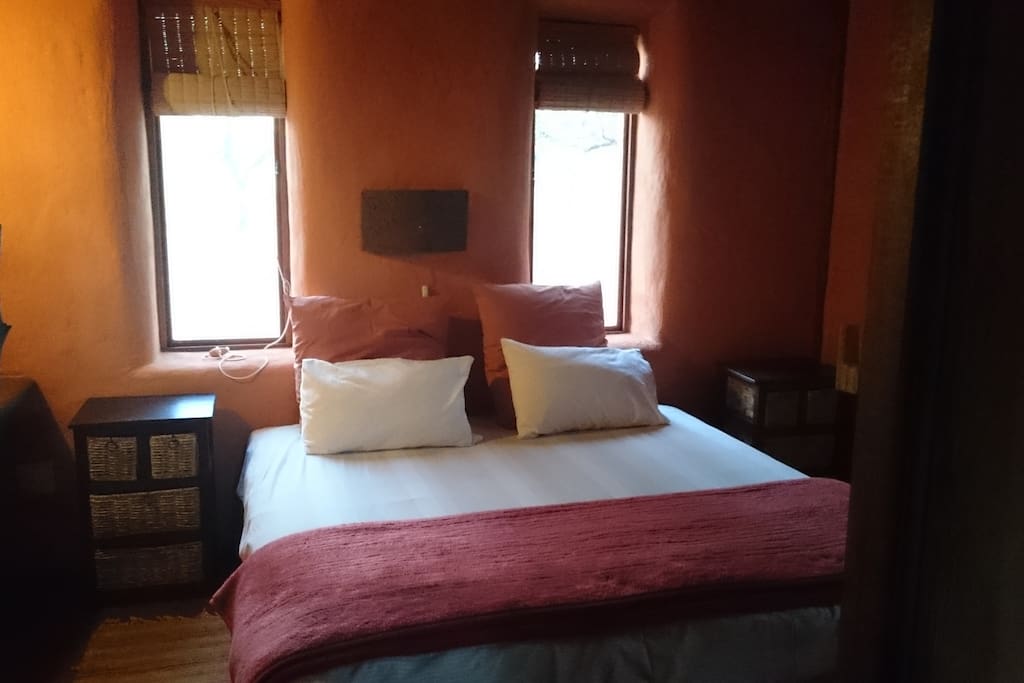 King-sized bed in ground floor room
