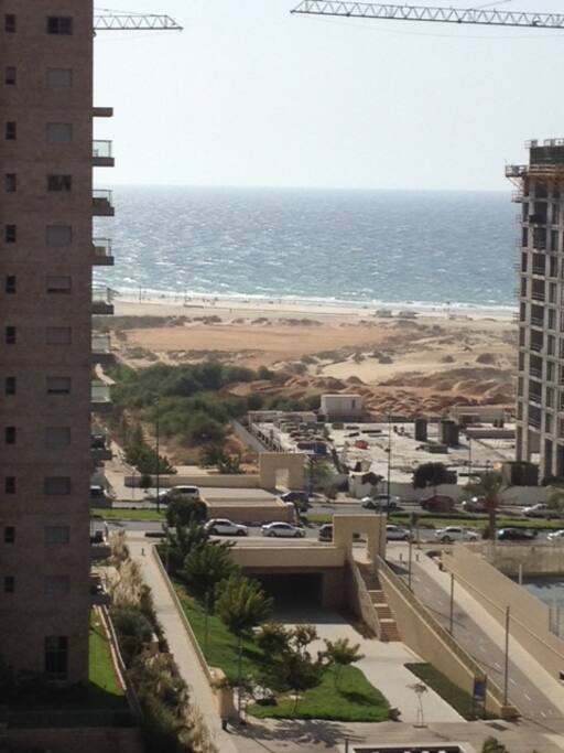 Beach view from apartment balcony.
