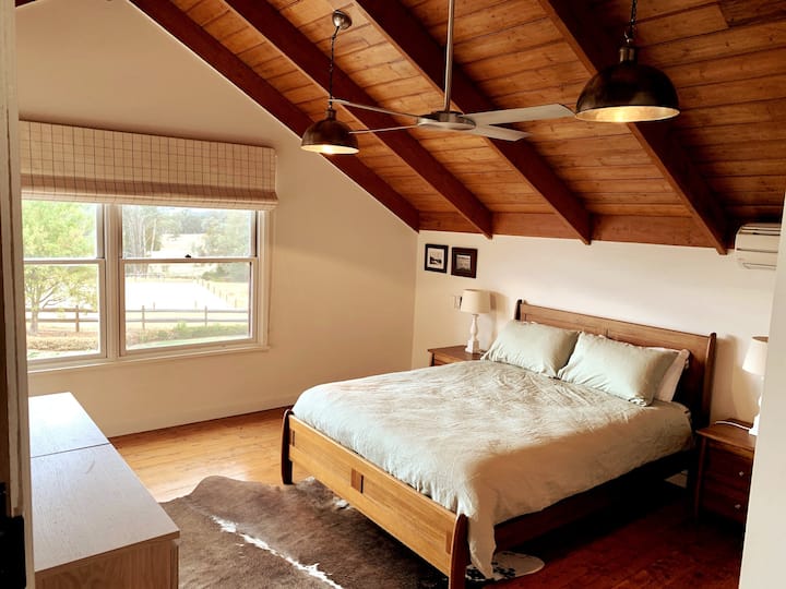 Bedroom 3 - 'The Loft' features views of the mountains.
