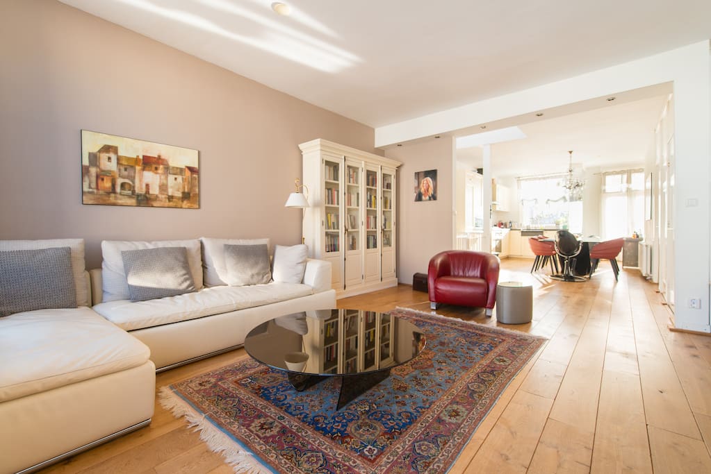 The couch is comfortable for hanging or lying on, watching TV or movies on the laptop.