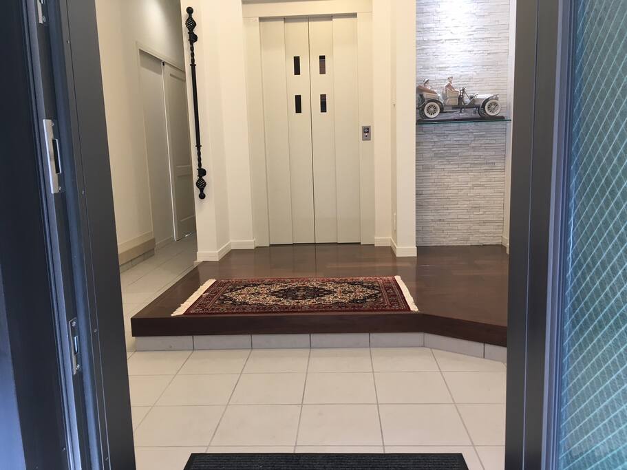Entrance and hallway are shared with the host family