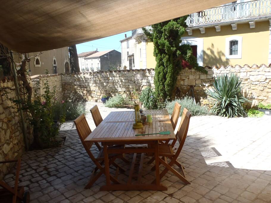 Sunny terrace with canopy for outdoor eating