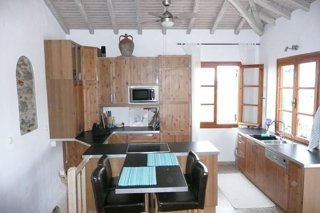 Kitchen with windows toward the sea