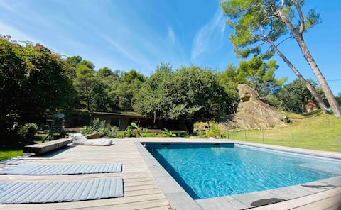 Villa with pool surrounded by nature