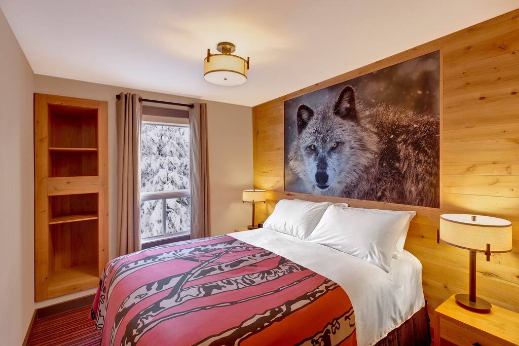 Enjoy the master bedroom with a queen sized bed.