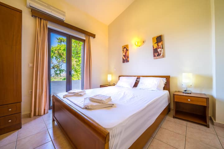 Bedroom 2: Queen bed and balcony