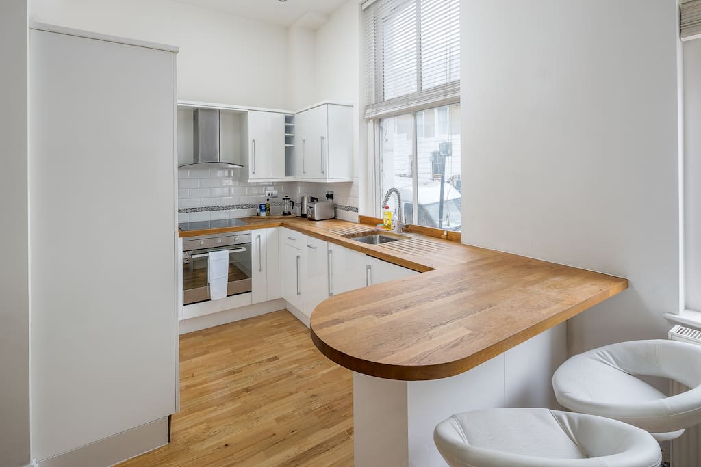 A sleek, fully-equipped kitchen...