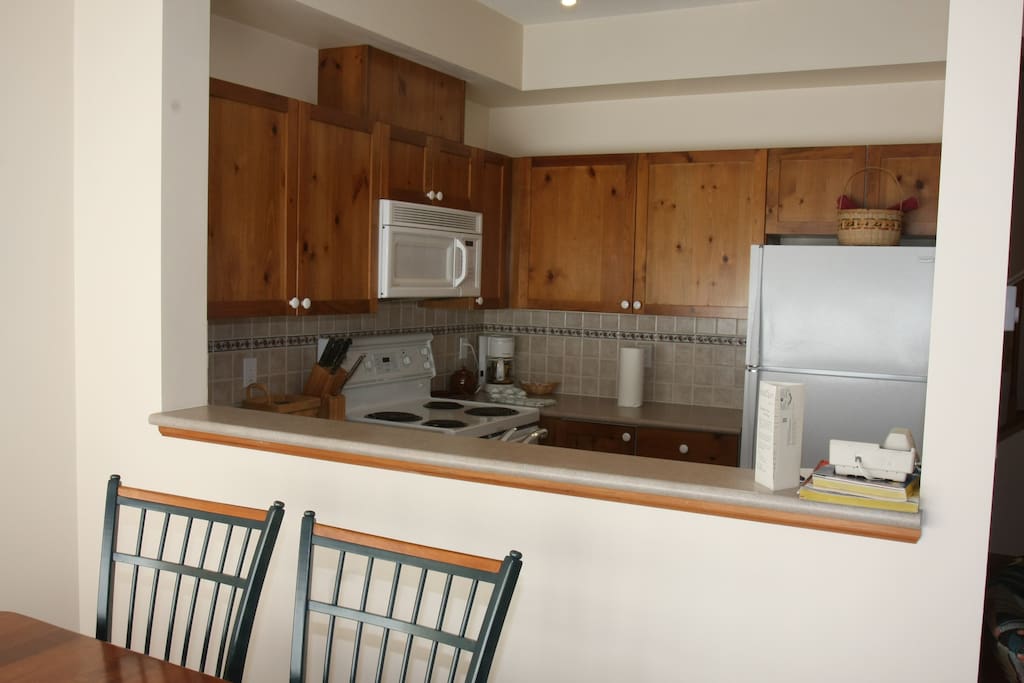 Enjoy your meals around the dining table with enough seating for everyone