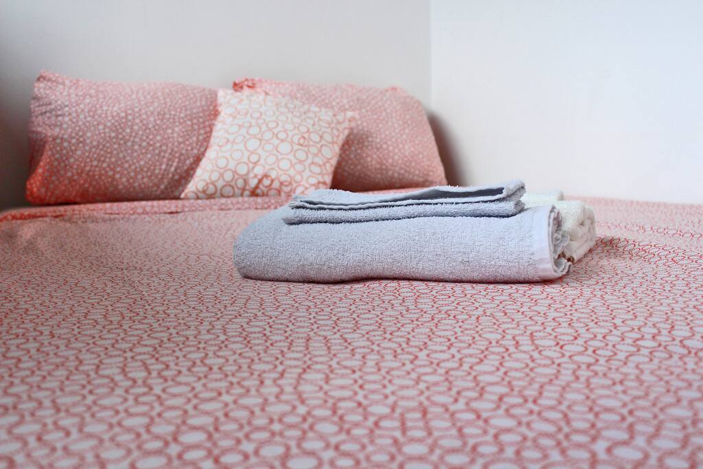 Clean linens and towels are provided.