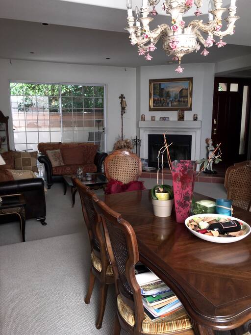 Open Dining Area/Living Room, Patio, And Guest Bathroom
