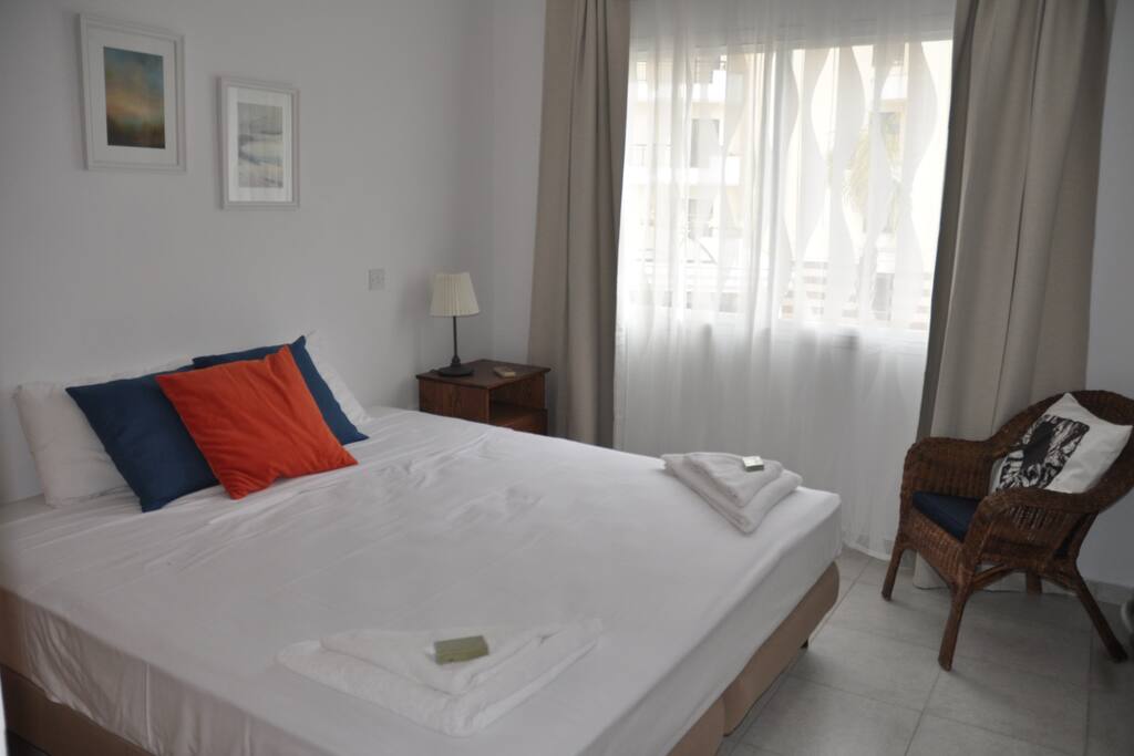 King Size bed (180cm wide) with high quality brand new mattress for a great night's sleep